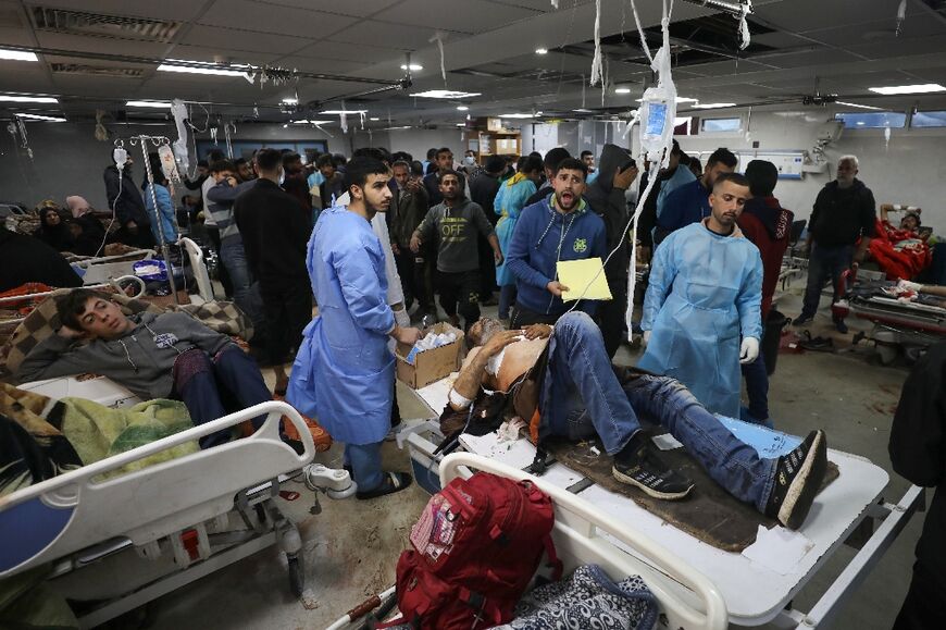 Wounded people receive treatment in Gaza City's Al-Shifa hospital, after what Hamas-run Gaza's health ministry was an Israeli strike that killed 20