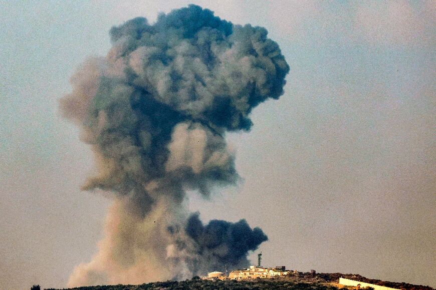 Smoke billows after Israeli bombardment around the southern Lebanese village of Aita al-Shaab