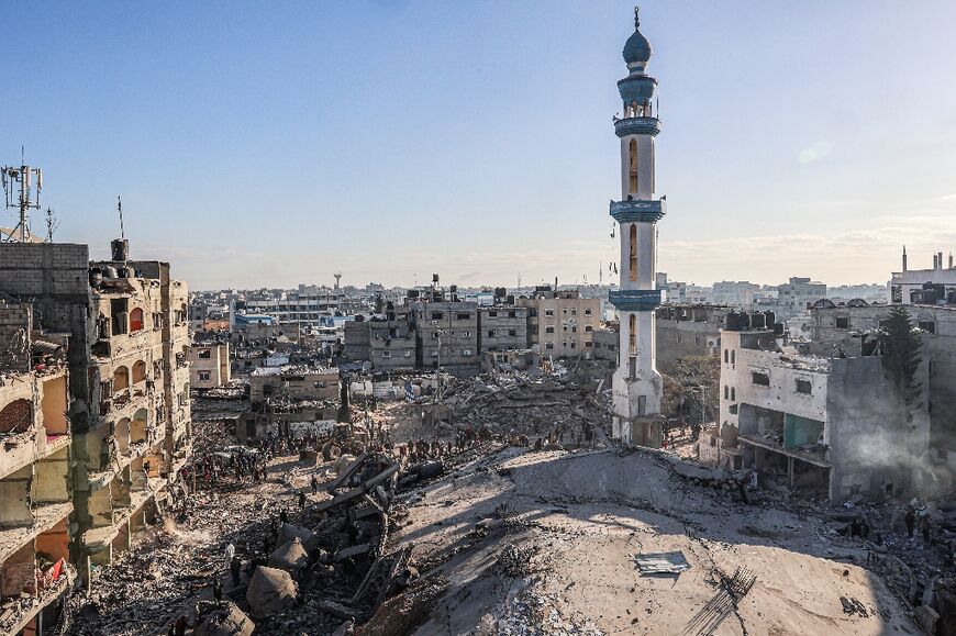 In Rafah residents walked among the rubble of the city's al-Faruq mosque after strikes