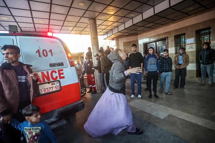 A woman reacts as injured Palestinians are brought to Khan Yunis's Nasser hospital in December