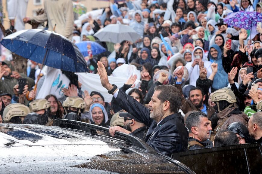 Hariri supporters braved driving rain to urge the ex-premier to make a political comeback after he withdrew in 2022 and moved to the United Arab Emirates
