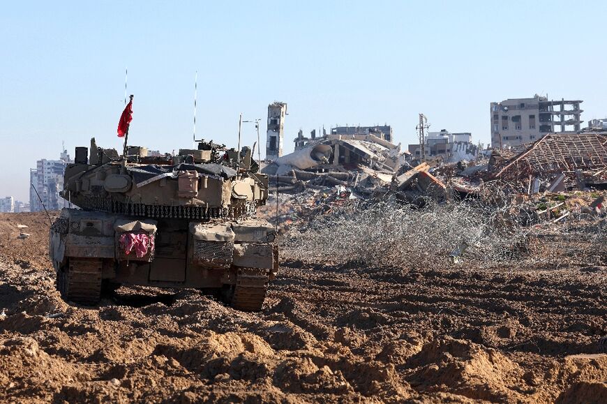 Israeli army vehicles inside Gaza City amid fighting between Israel and the Palestinian militant group Hamas