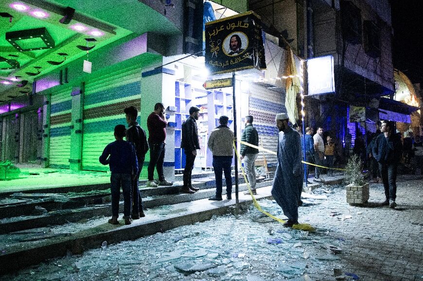 The exploded in a market in the city held by pro-Turkish forces, killing at least eight people and wounding more than 20 others, a war monitor said.
