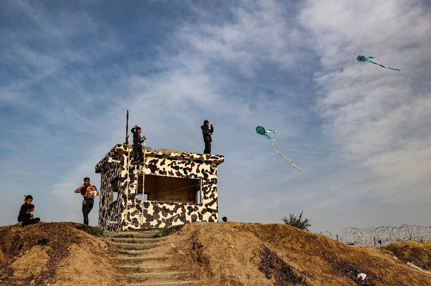 The kites fly back and forth across the besieged Palestinian territory's border with Egypt