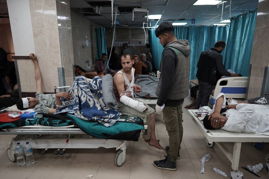Injured Palestinians receive treatment at the Shuhada al-Aqsa Hospital in Deir el-Balah in the central Gaza Strip on April 3, 2024     