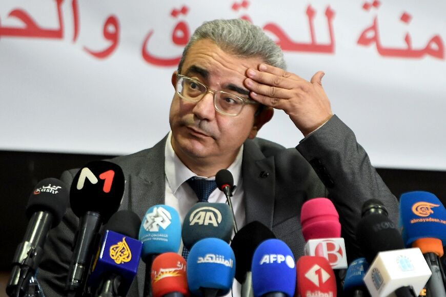 Bar association chief Hatem Meziou speaks to reporters in the wake of the arrests