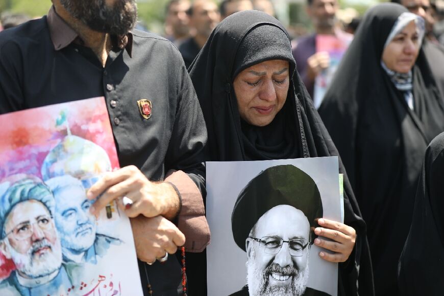 Iranian mourners attend the funeral of late president Ebrahim Raisi in the city of Mashhad on May 23, 2024