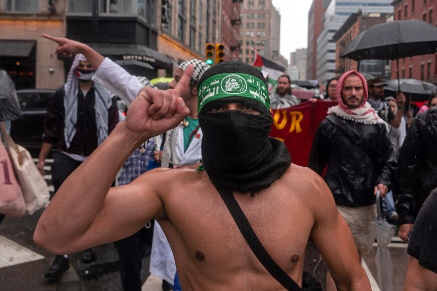 A man wearing a Hamas headband marches alongside pro-Palestinian demonstrators at a rally in New York City on May 27, 2024
