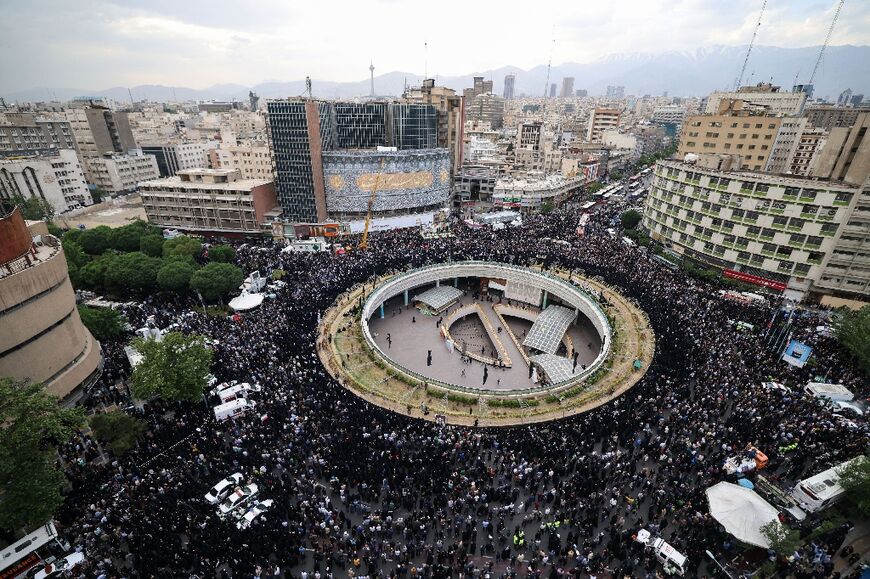 Mourners throng Valiasr Square in the heart of Tehran on Monday