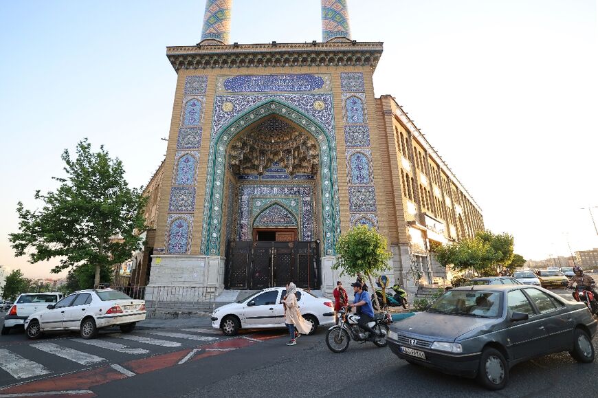 People walk outside Abolfazl Mosque in Tehran 
