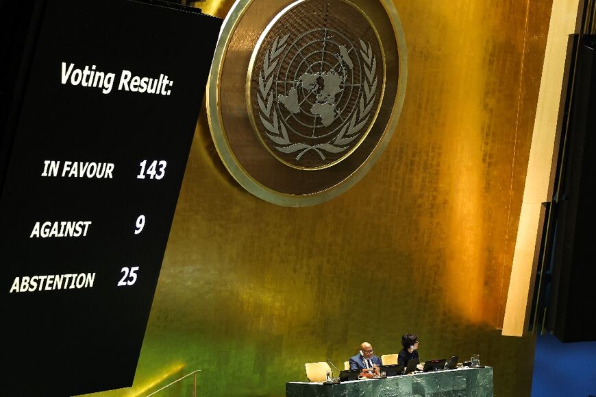 The results of a vote on a resolution for the UN Security Council to reconsider and support the full membership of Palestine into the United Nations is displayed during a special session of the UN General Assembly