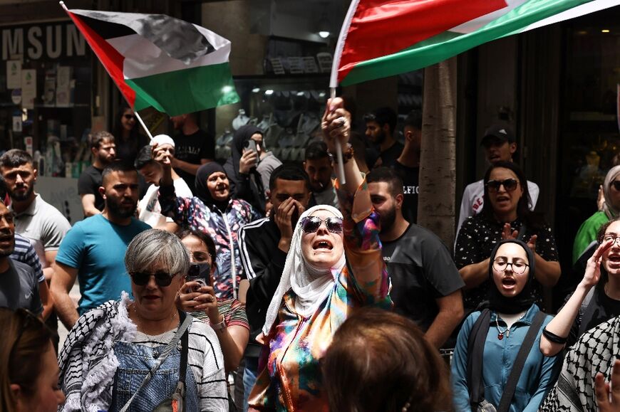 Palestinians in the occupied West Bank city of Ramallah took to the streets in protest at the Israeli strike on Rafah