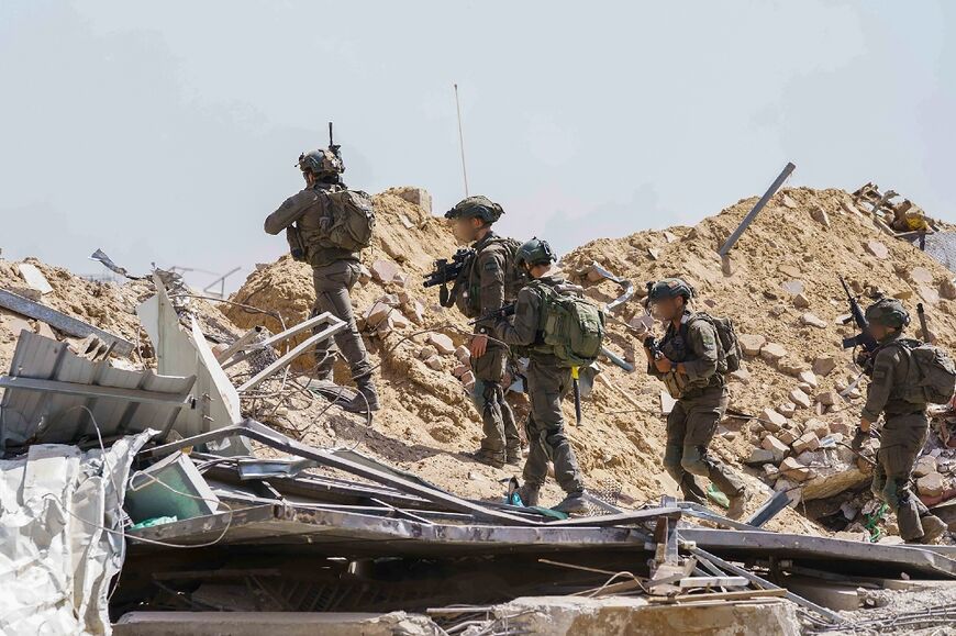 Israeli soldiers during military operations in the Gaza Strip, seen in a picture released by the Israeli army on May 24, 2024 