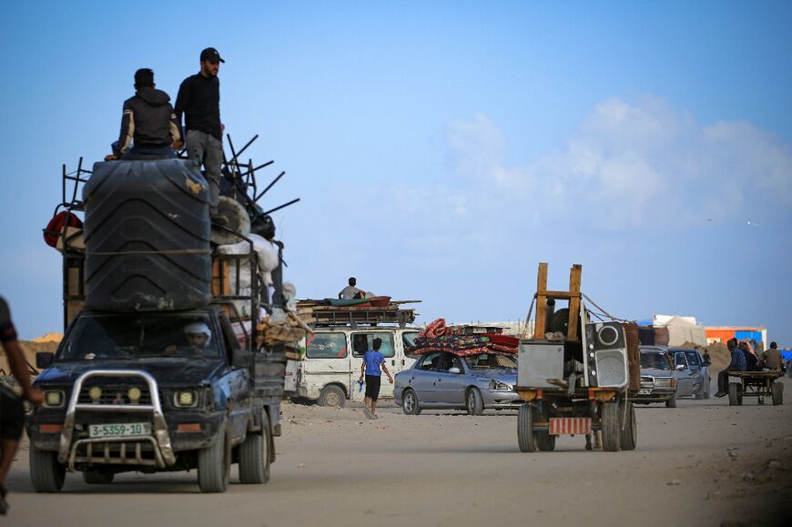 Displaced Palestinians arrive to take refuge at the Al-Mawasi camp in Khan Yunis in the southern Gaza Strip 