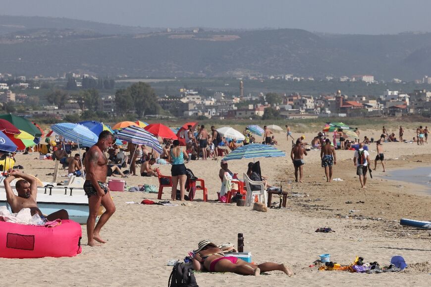 Alongside the threat of war, Lebanese were briefly escaping a crushing economic crisis by visiting the beach