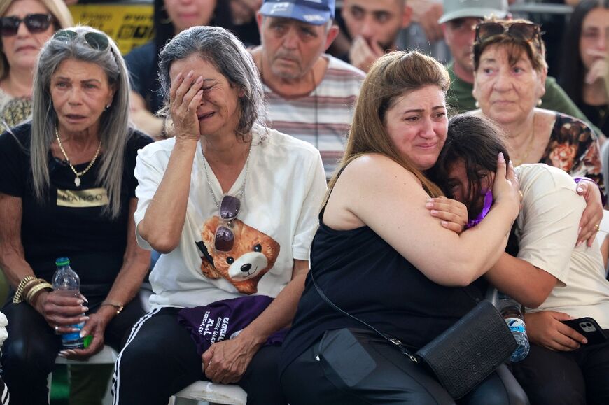 Relatives and friends grieve during the funeral of Israeli soldier Almog Shalom in Jerusalem on June 11, 2024, the day after he was killed with three other soldiers in the Gaza Strip