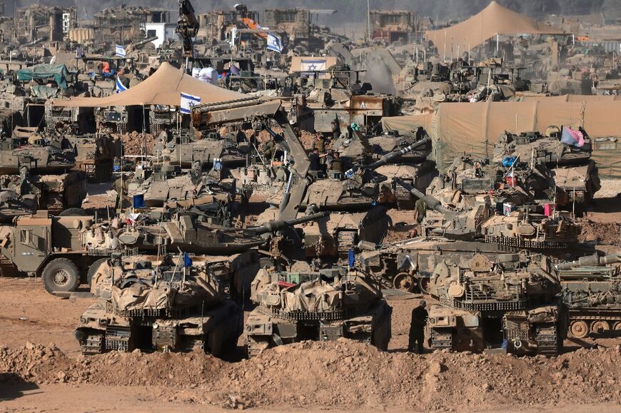 Israeli tanks near the border with the Gaza Strip, where fighting has raged for almost eight months