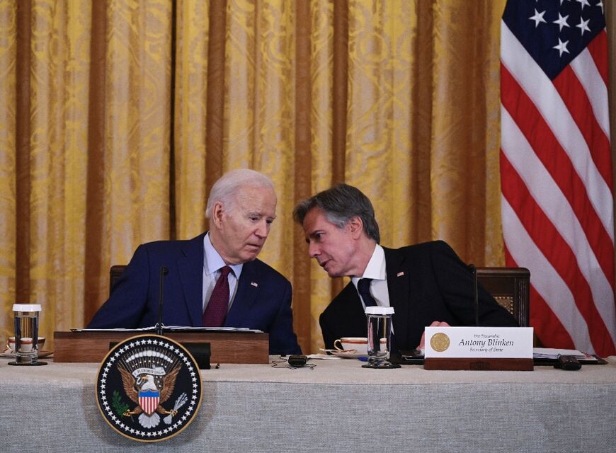 US President Joe Biden speaks with Secretary of State Antony Blinken on April 11, 2024