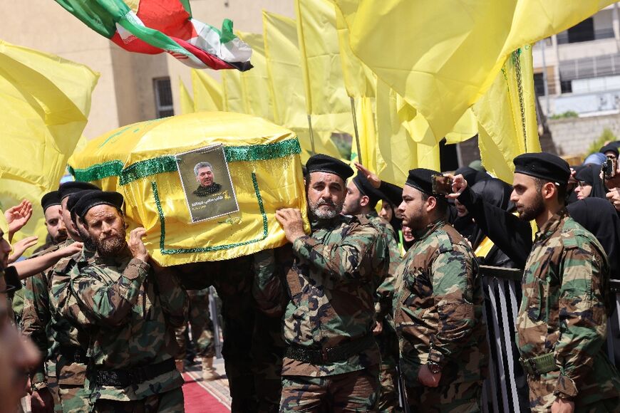 An Israeli strike killed a senior Hezbollah commander in Lebanon, stoking a retaliatory barrage of projectiles
