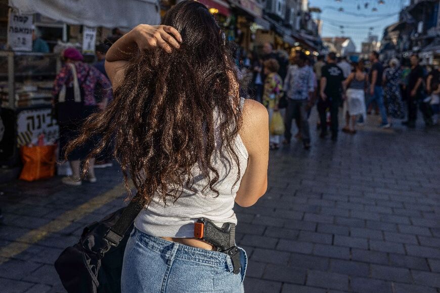 Feminist groups have criticised the increase in gun permits, saying they put women at greater risk of violence and death
