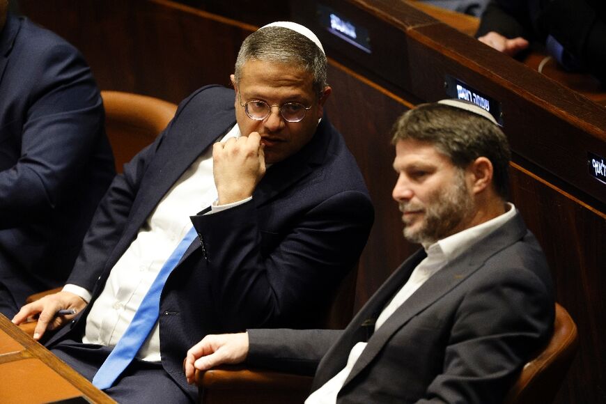 Human rights groups say the presence of far-right settlement champions Itamar Ben Gvir (L) and Bezalel Smotrich in the Israeli government has emboldened hardline settlers