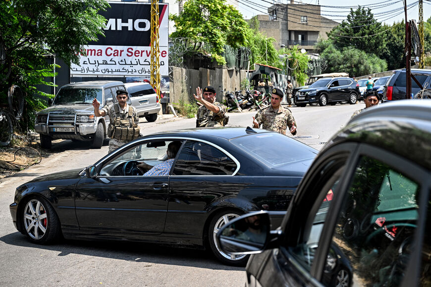 Lebanese army forces turn back motorists as they close a road near the US embassy in Beirut on June 5, 2024, after a Syrian man was arrested following a shooting near the embassy. (Photo by JOSEPH EID / AFP) (Photo by JOSEPH EID/AFP via Getty Images)