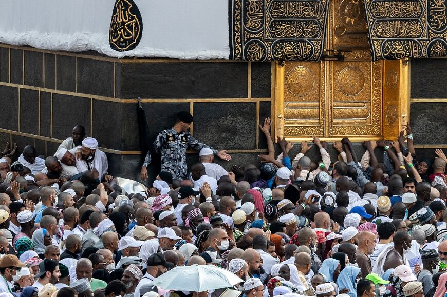 Muslim pilgrims perform the farewell circumambulation or "tawaf", circling seven times around the Kaaba, Islam's holiest shrine, at the Grand Mosque in the holy city of Mecca on June 18, 2024 at the end of the annual hajj pilgrimage