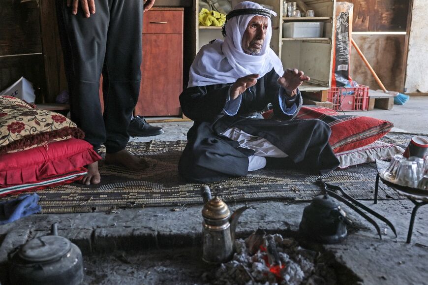 Freij Hawashla, born in 1939, prepares tea at the unrecognised Bedouin village of Ras Jrabah