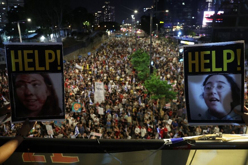 Demonstrators in Tel Aviv on June 8, 2024 call for a deal to free remaining hostages held by militants in Gaza -- Metzger's daughter-in-law has regularly joined the protests