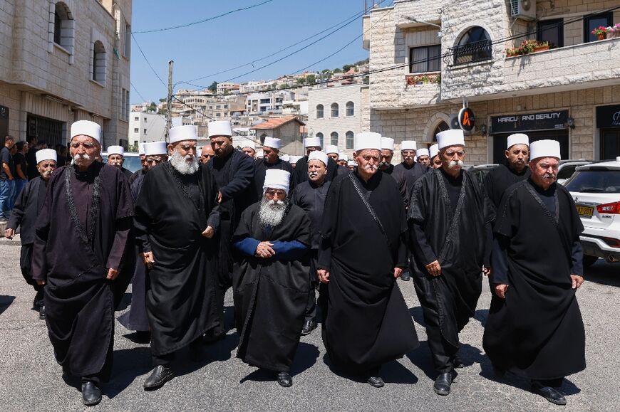 The Druze community in the Israeli-annexed Golan Heights still mostly identify as Syrian more than half a century after Israel seized the territory