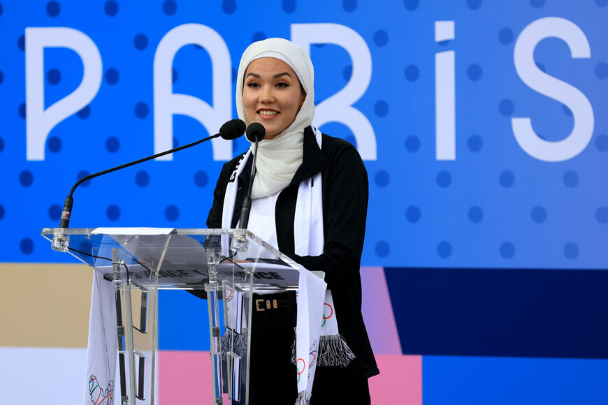 PARIS, FRANCE - JULY 22: Masomah Ali Zada of the Refugee Olympic Team speaks during the Athletes' Call for Peace at the Olympic Village Plaza ahead of the Paris 2024 Olympic Games on July 22, 2024 in Paris, France. (Photo by Maja Hitij/Getty Images)