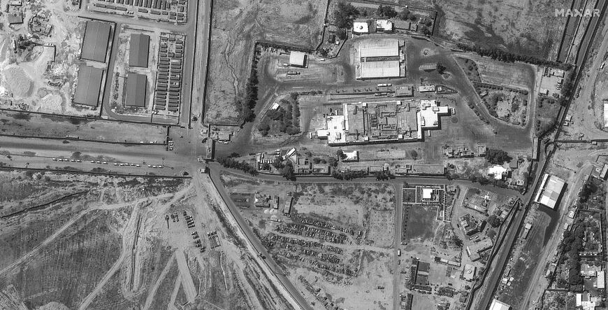 This handout image courtesy of Maxar Technologies shows an aerial view of the Rafah border crossing between Gaza and Egypt, where Israel says it must retain control of the Palestinian side