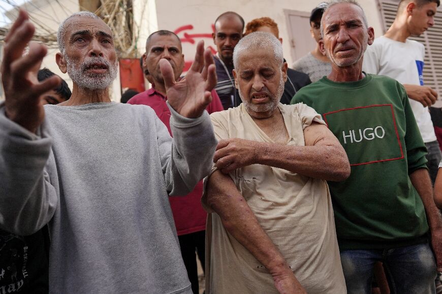 Palestinians who had been detained by Israel arrive for a check-up at Gaza's Al-Aqsa Martyrs Hospital in Deir al-Balah