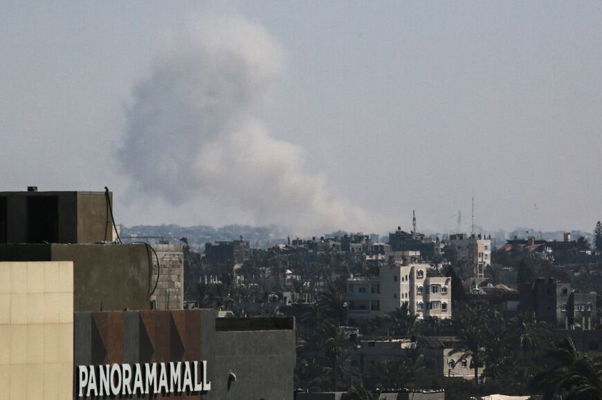 Smoke billowing over southern Gaza during Israel's latest military operation in the Khan Yunis area