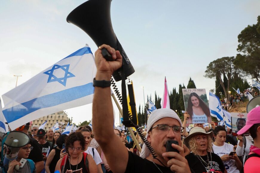 Protesters in Jerusalem rally on the way to the Prime Minister's office in Jerusalem, calling for a hostage release deal