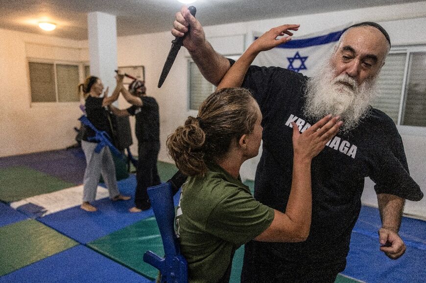 Amid security fears since the October 7 Hamas attacks, Israelis have bought more guns, but some are learning self-defence as well