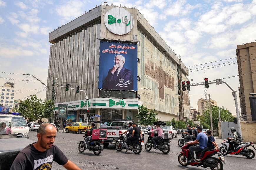An election banner for Saeed Jalili is seen on the facade of a building in Tehran