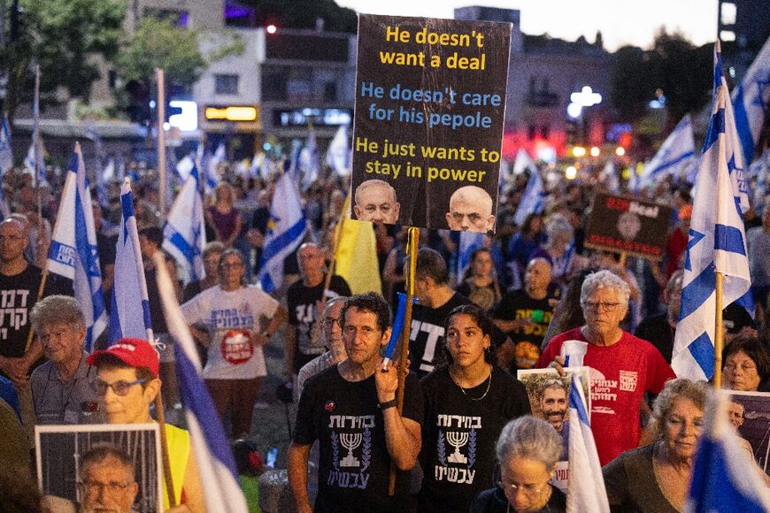 Israeli anti-government protesters rally calling for a hostage release deal, in the coastal city of Haifa