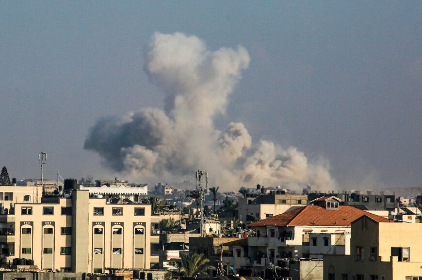 Smoke billows following Israeli bombardment near Deir al-Balah in the central Gaza Strip