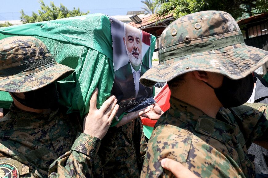 Supporters hold a symbolic funeral for Hamas leader Ismail Haniyeh in Beirut