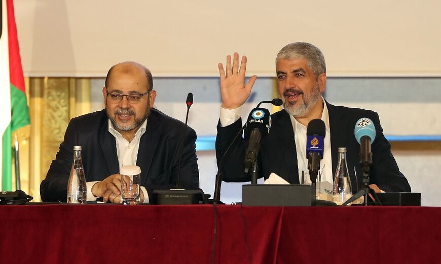 Khaled Meshaal (R) with Musa Abu Marzuk (L) in the Qatari capital, Doha on May 1, 2017 -- both men are tipped as the potential Hamas political leader after the killing of Ismail Haniyeh