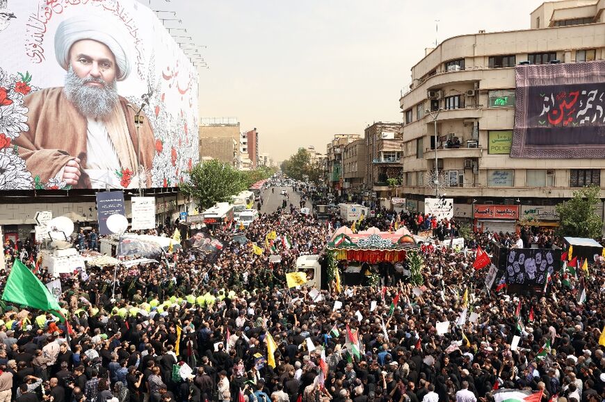 Thousands of mourners attended a funeral ceremony in Tehran for slain Hamas political chief Ismail Haniyeh