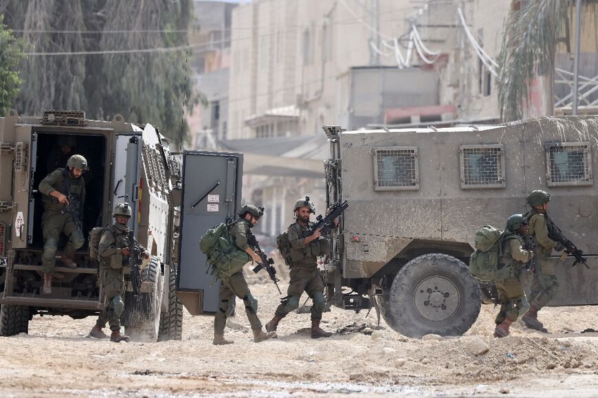 Israeli soldiers operate during a raid in the Nur Shams camp for Palestinian refugees near the city of Tulkarem in the Israeli-occupied West Bank