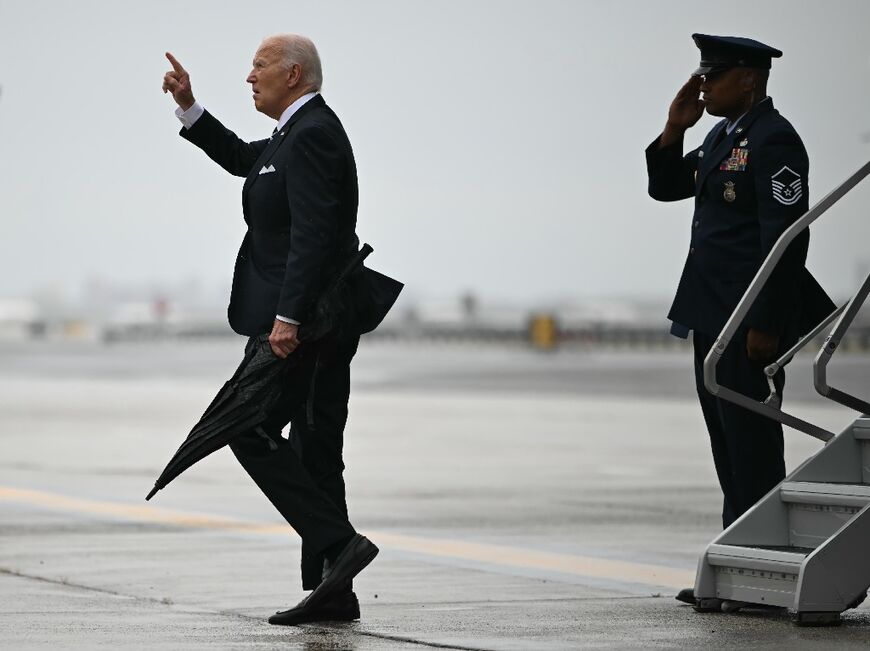 US President Joe Biden steps off Air Force One upon arrival at John F. Kennedy International Airport in New York City 