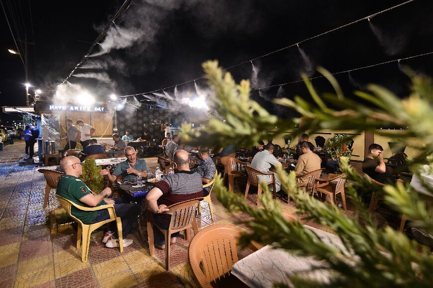 Years after the Islamic State group's defeat in the Iraqi city of Mosul, newfound stability has brought restaurant openings, pleasure cruises on the river Tigris, and amusement parks