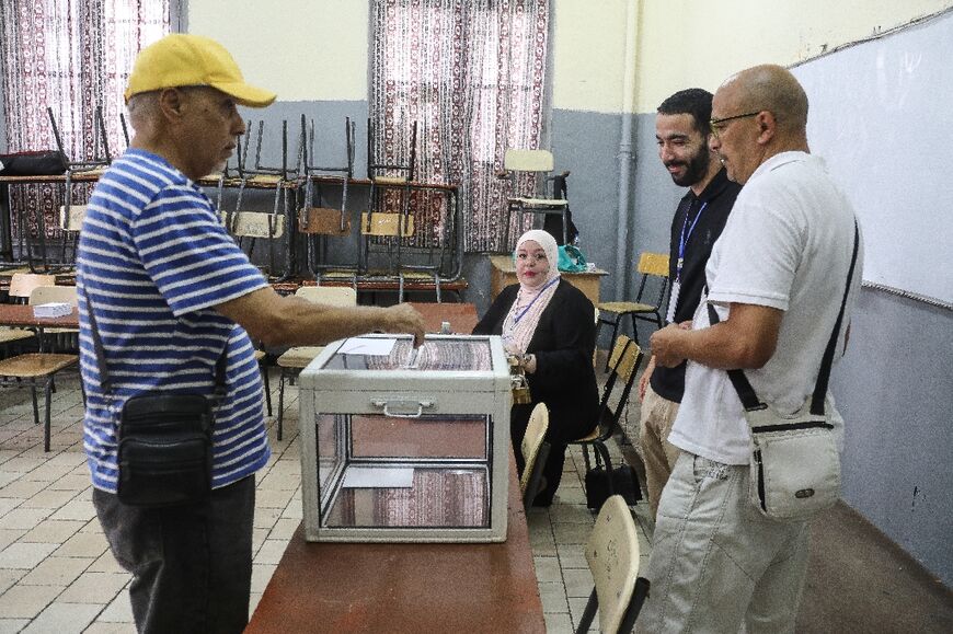 Voting at a polling station in the capital Algiers