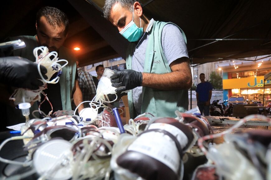 Medics collect blood donations in Beirut's southern suburb