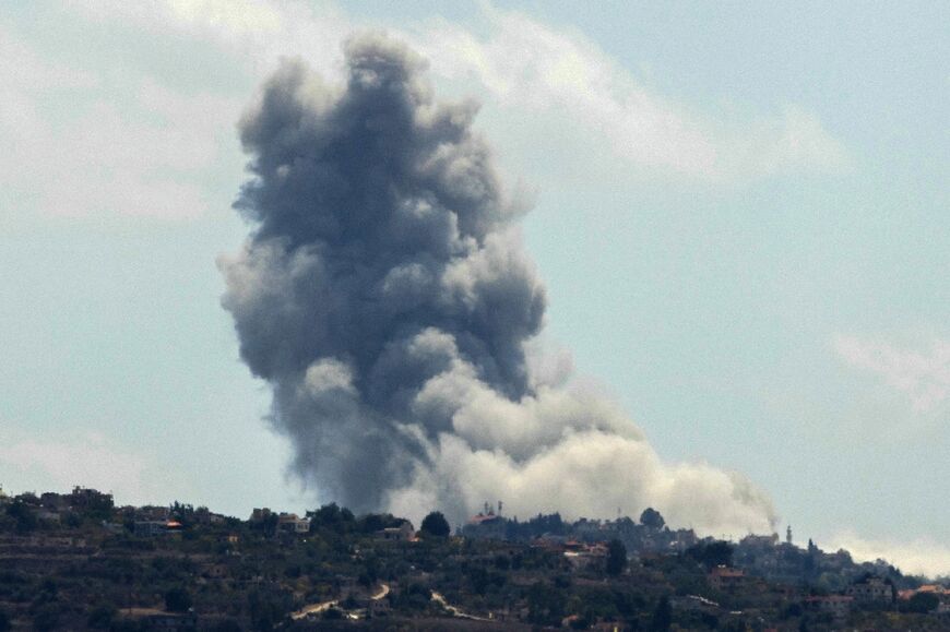 Smoke billowing over the site of an Israeli strike on southern Lebanon