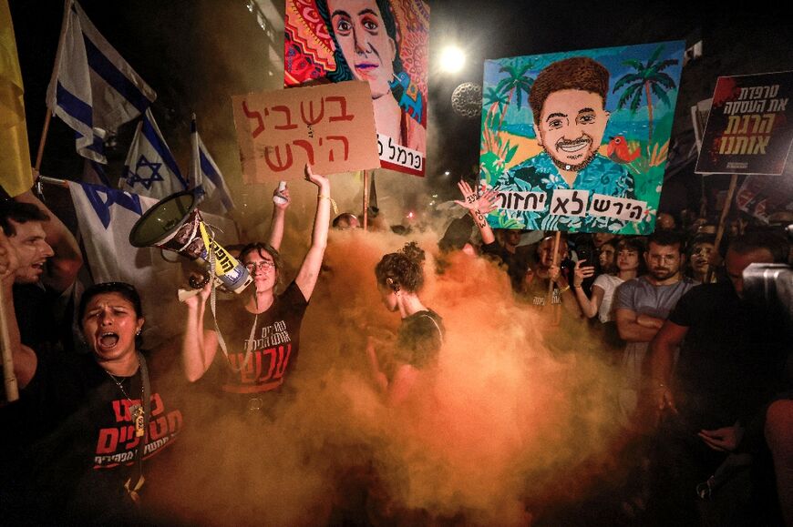 Israeli demonstrators at an anti-government protest calling for action to release Gaza hostages, in Jerusalem