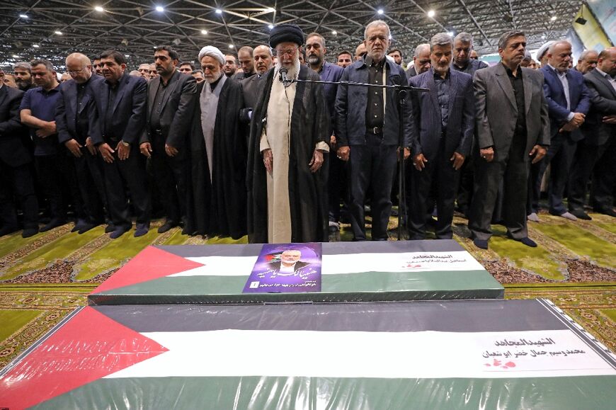 Iranian supreme leader Ayatollah Ali Khamenei leads prayers over the coffin of slain Hamas leader Ismail Haniyeh